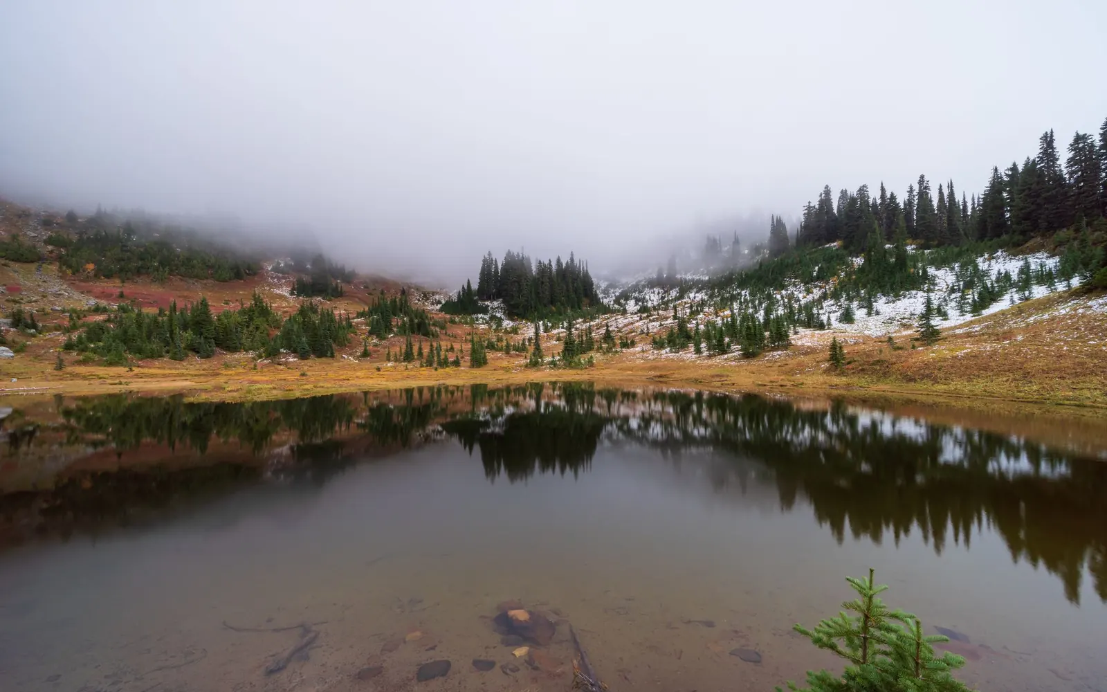 Misty mountain lake at dawn, ungraded